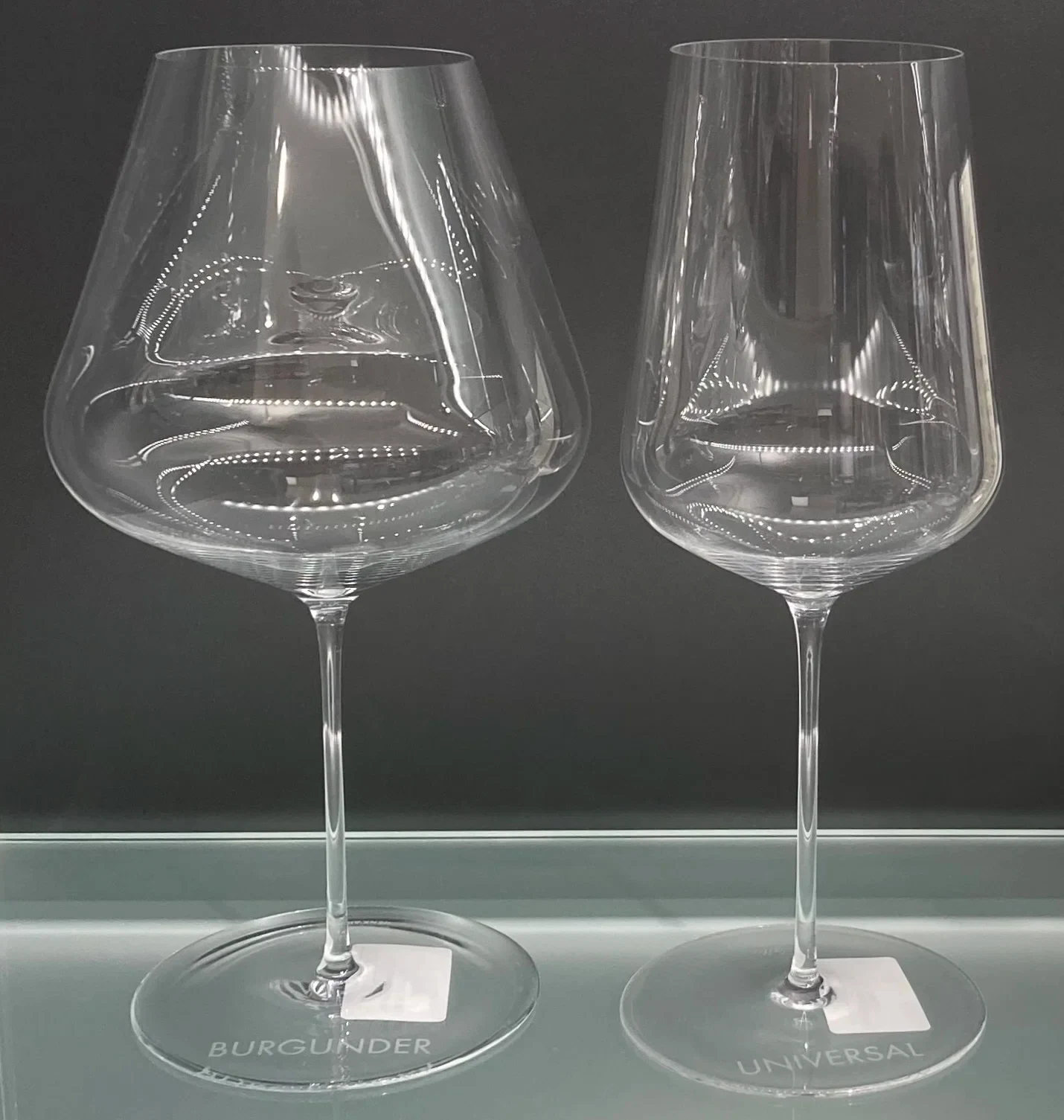 A Zalto Burgundy glass and Universal glass displayed together