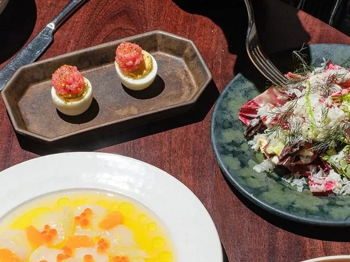 Deviled eggs with bluefin tuna belly and other dishes from the reimagined menu at Darling West Hollywood.