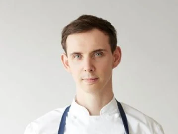 Daniel Calvert, whose departure led to Sézanne Michelin Stars Removed, is pictured with a dish and restaurant interior.