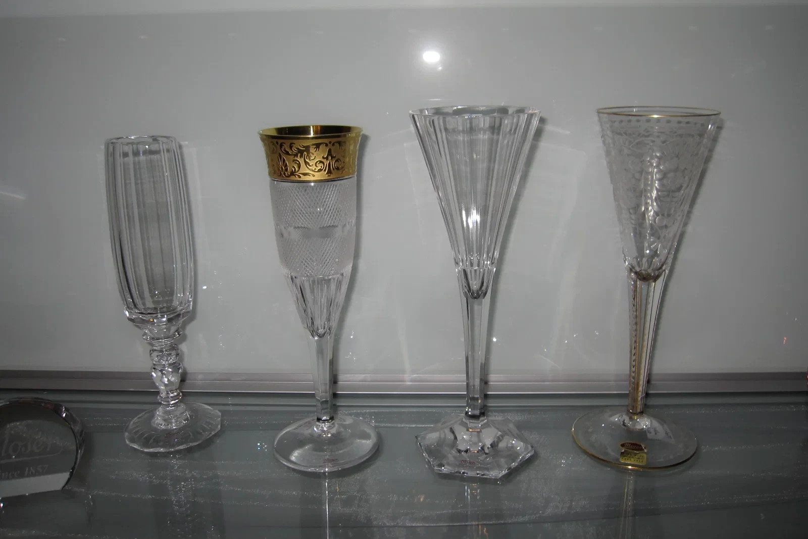 Four Moser Champagne glasses, including Maria Theresia, Splendid, and Maharani designs