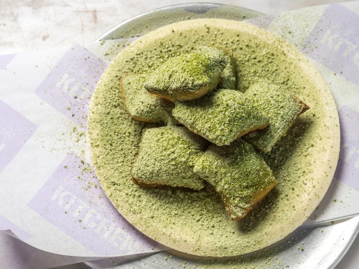 A matcha-dusted beignets, a sweet highlight from the pastry course.