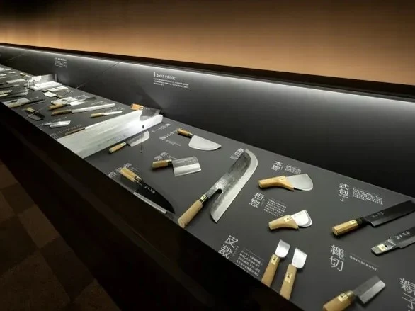 A display case at the Sakai Traditional Crafts Museum showcases the artistry of Sakai knife forges.