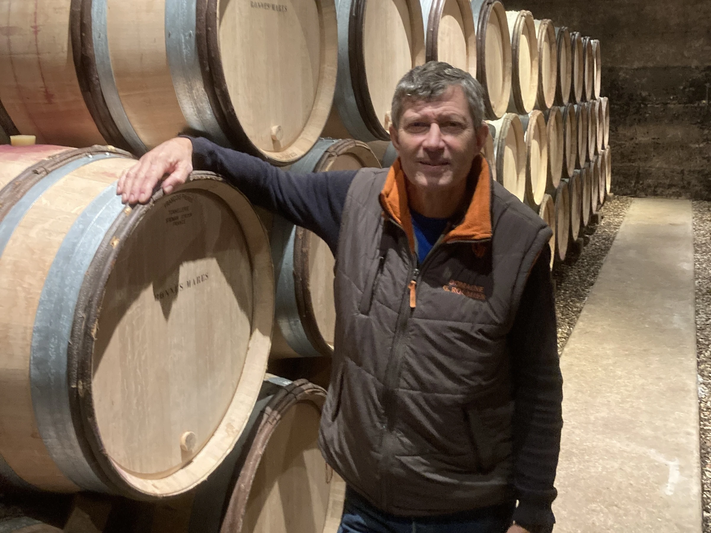 Christophe Roumier among the Bonnes-Mares barrels in the Domaine Georges Roumier cellar (via The Fine Wine Review).