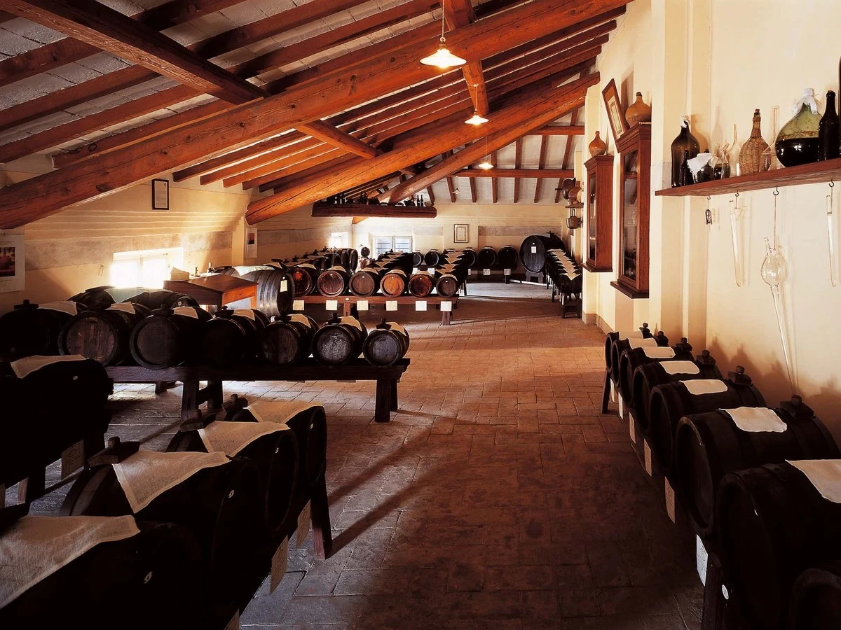 Museo del Balsamico Tradizionale in Spilamberto displays historic barrel batteries in its traditional acetaia attic.