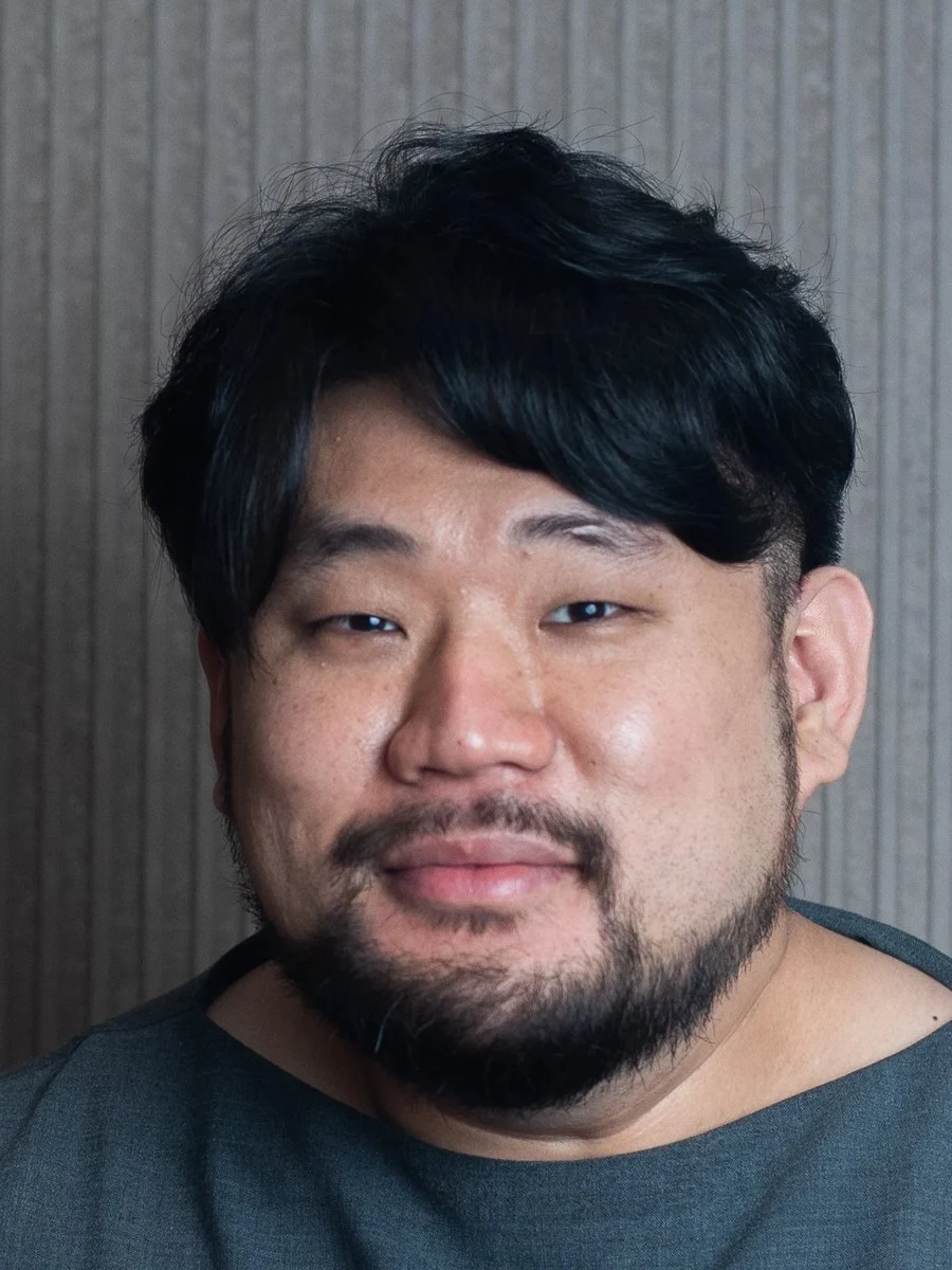 Hasung Lee, chef behind Oyatte, smiles in a portrait.