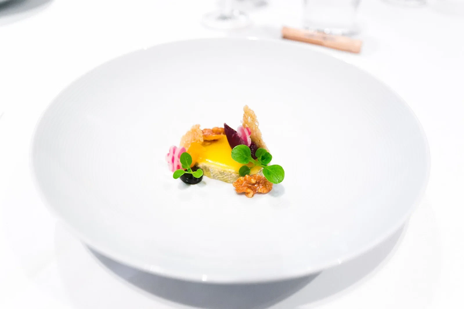 A plated Elysian Fields Farm lamb saddle dish