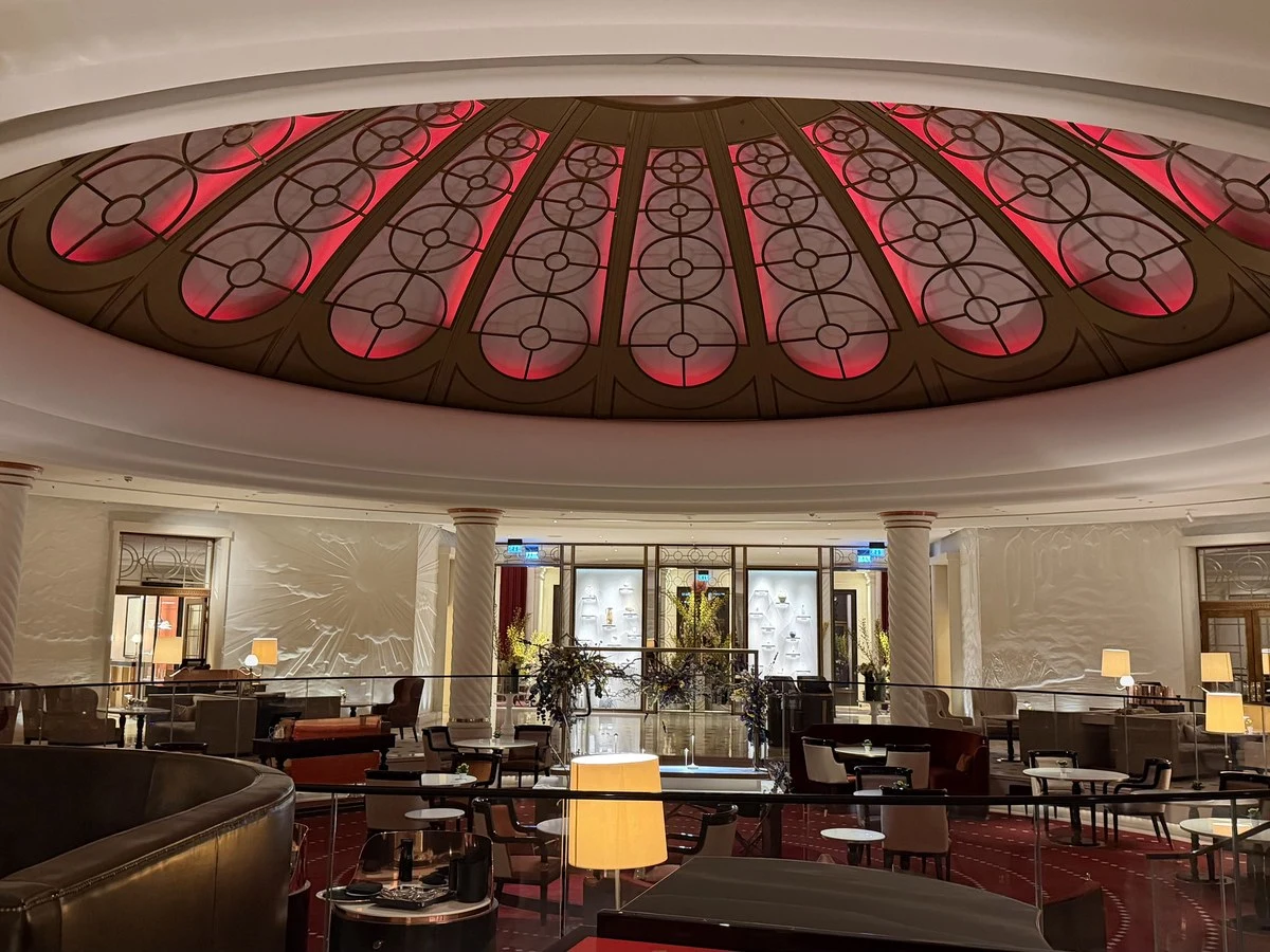 The Rotunda bar at Cooper's Cut offers a grand, illuminated setting for an unforgettable experience.