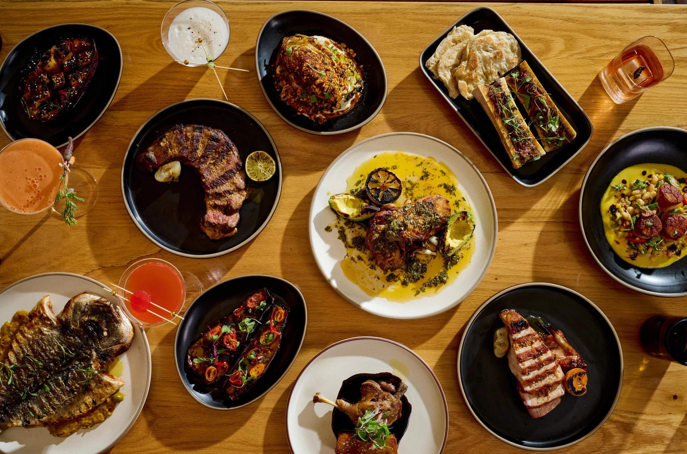 Keith Corbin's diverse menu at Alta Adams, featuring fire-roasted cabbage and other exquisite dishes.
