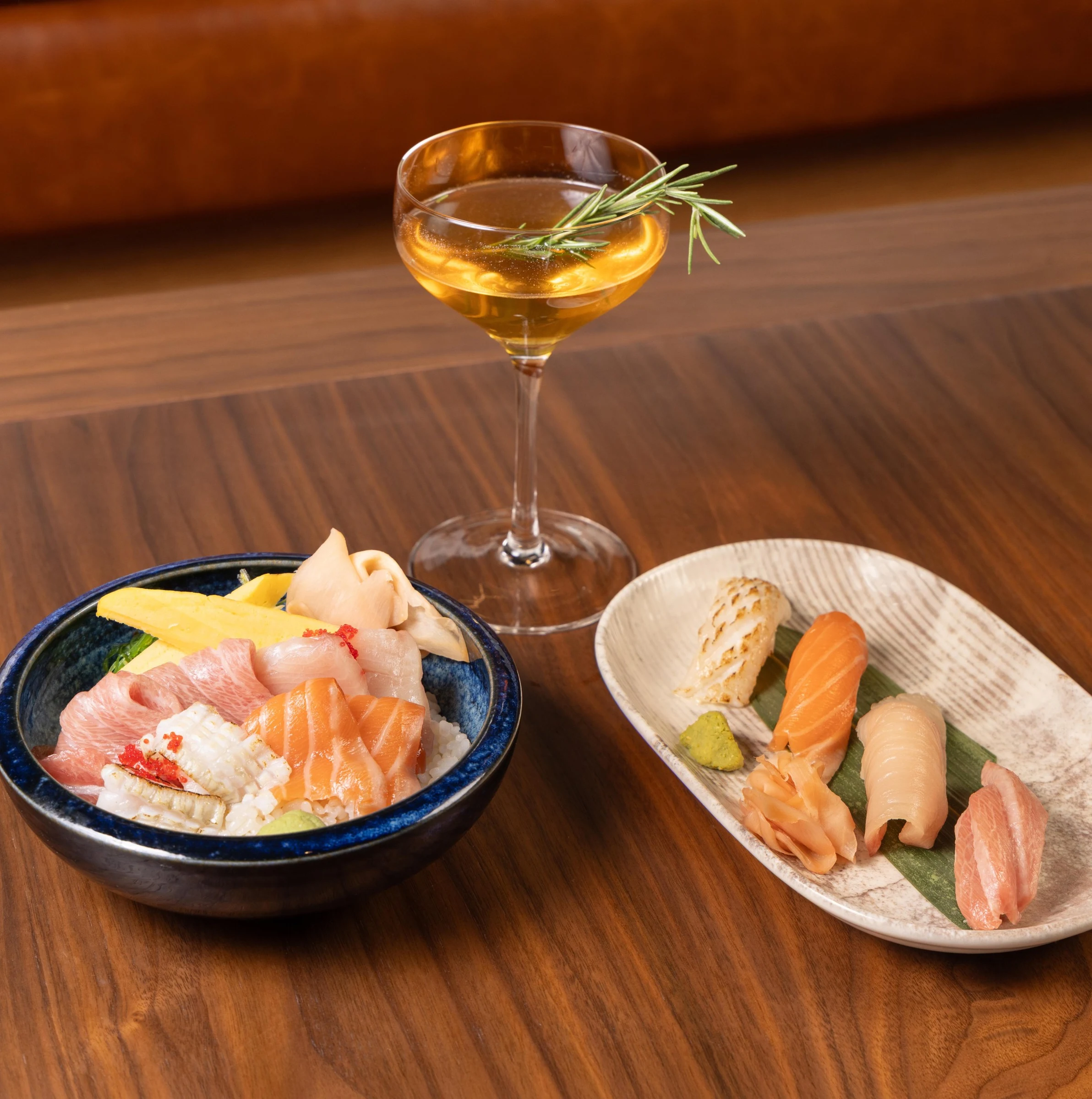 Yukinori Yamamoto's kaisen chirashi donburi, sushi, and a cocktail offer a delightful lunch experience.