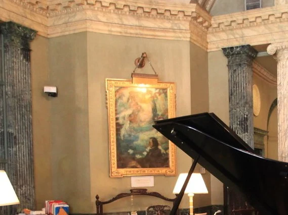 Steinway & Sons: A grand piano awaits selection in the ornate factory showroom.