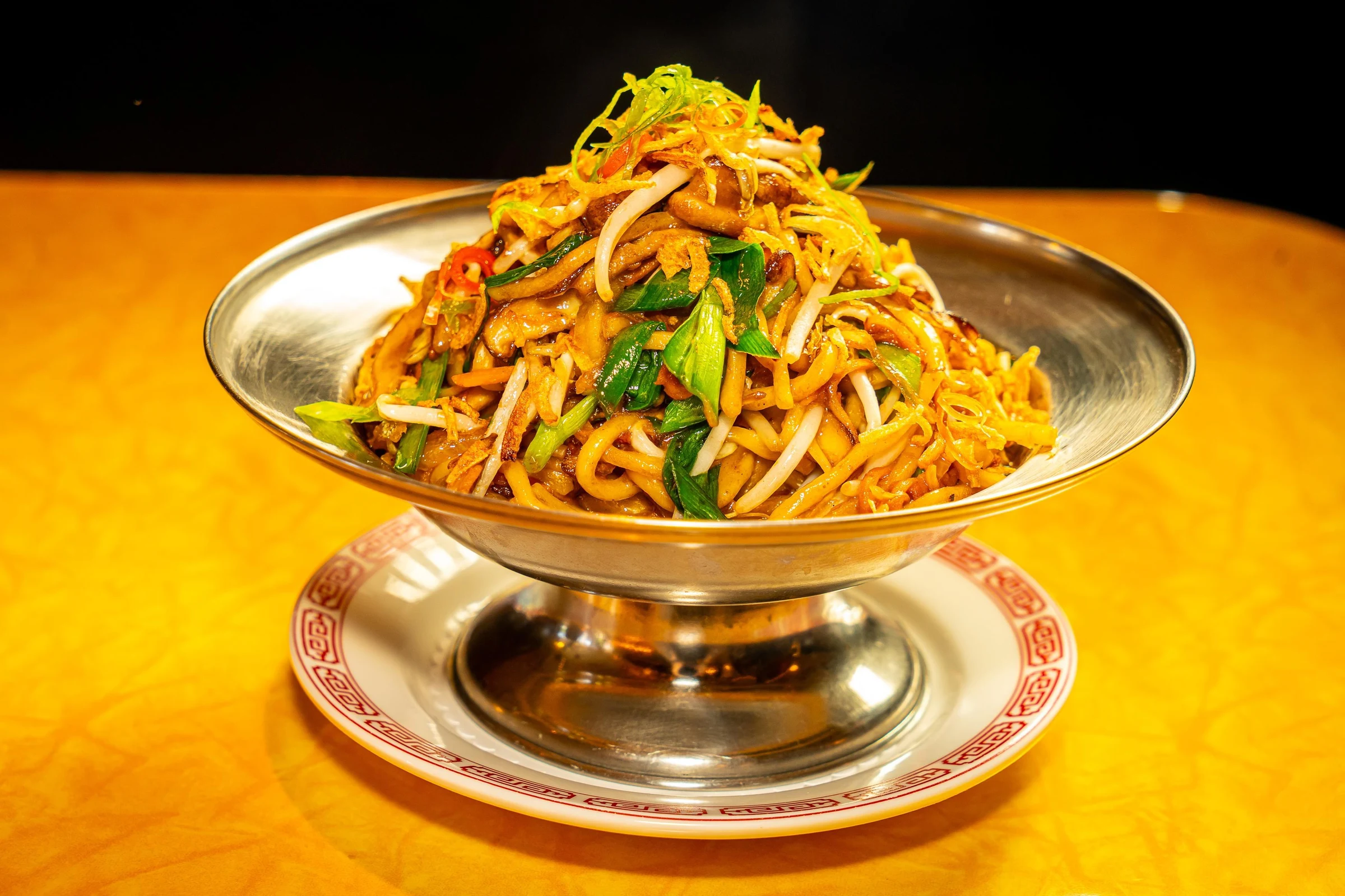danny garcia's rich chili or stew with beans and crispy fried onions, a taste of his Only Goods brand.