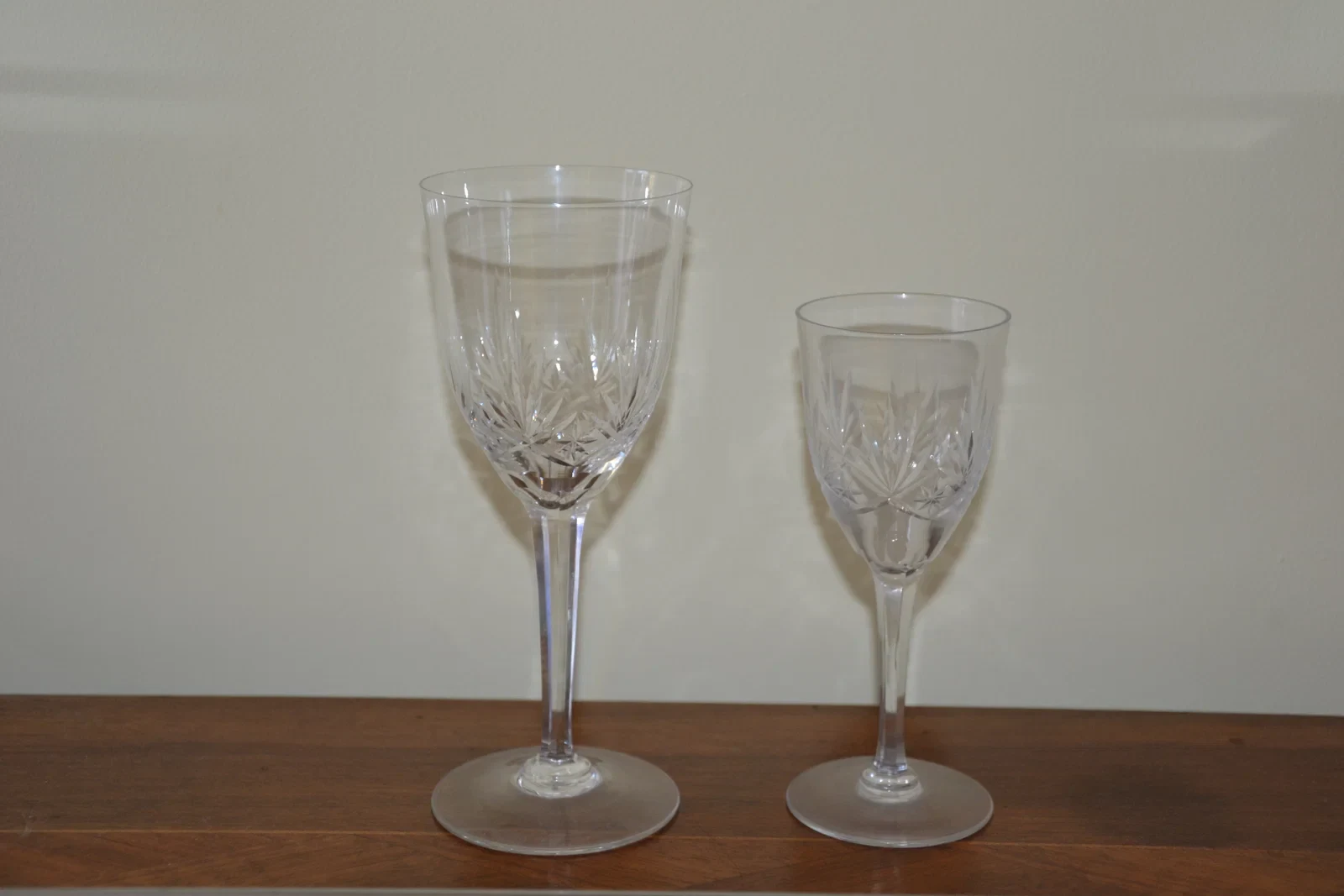 Two cut-crystal stemmed glasses produced by Saint-Louis