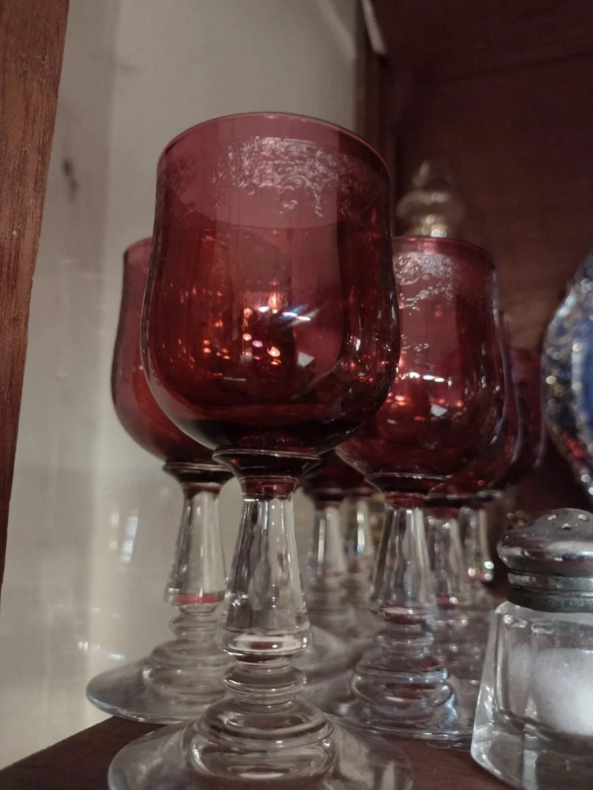 Historical ruby-red Baccarat crystal wine glasses with clear stems